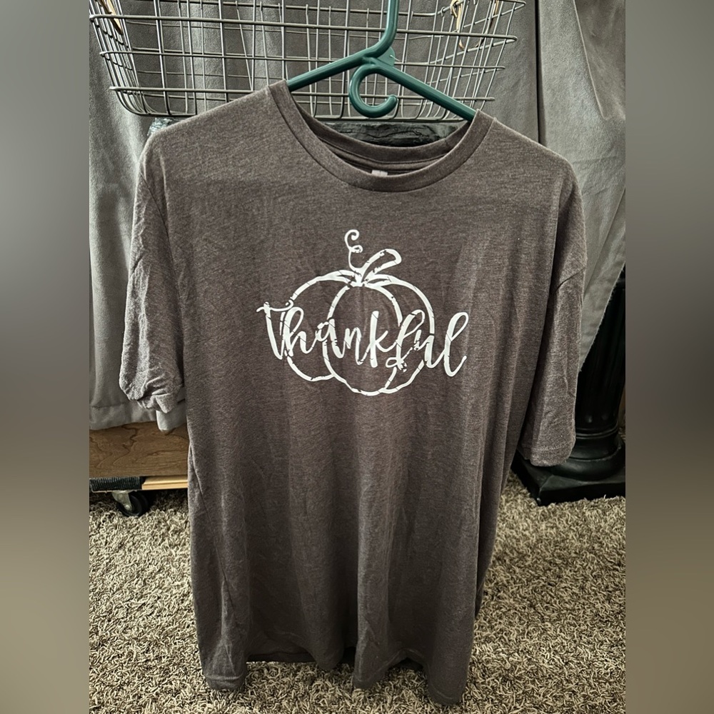 Brown T-Shirt that says “Thankful” with a pumpkin